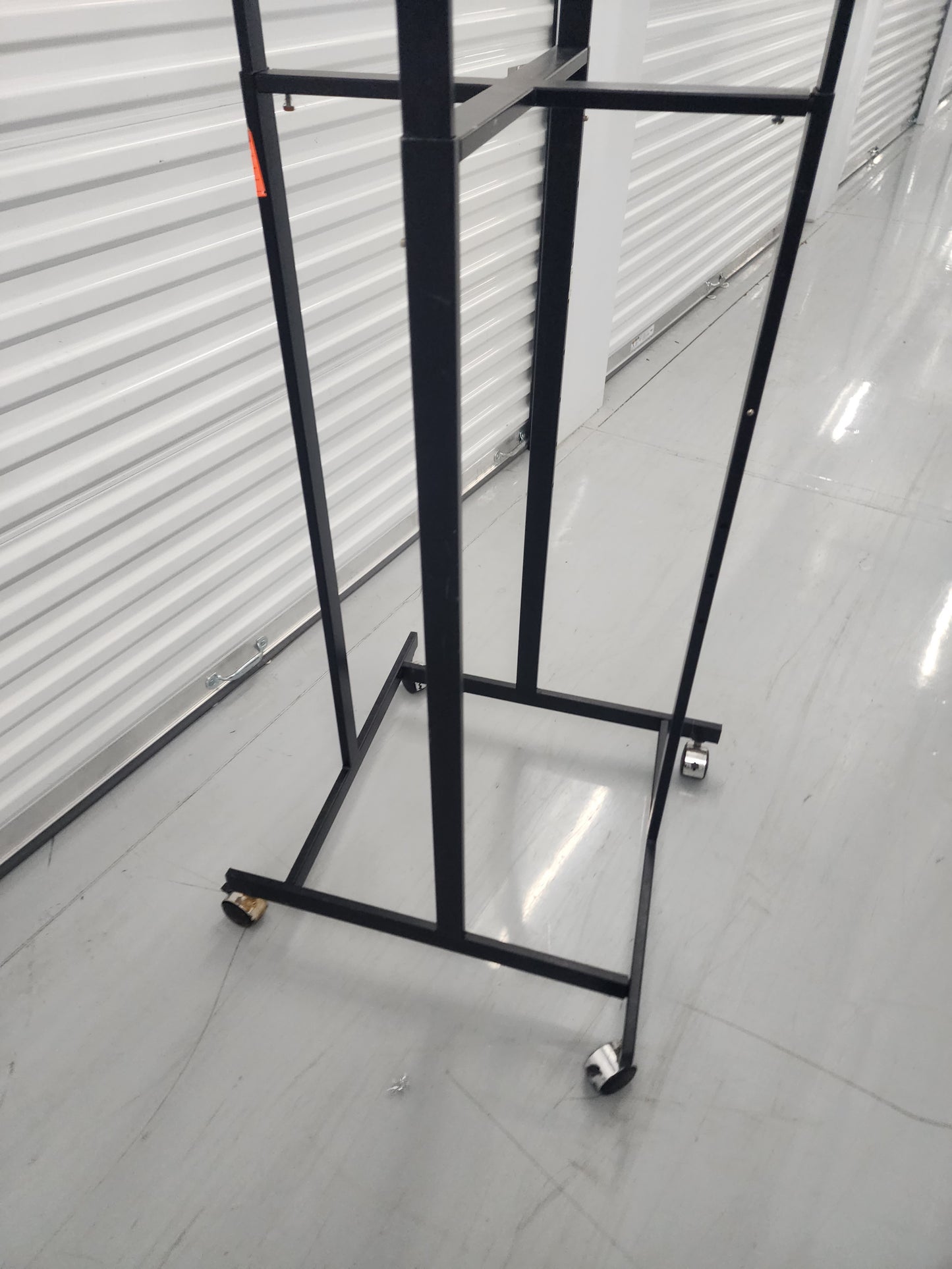 Multi-arm Clothing rack retail display Black Metal with wheels