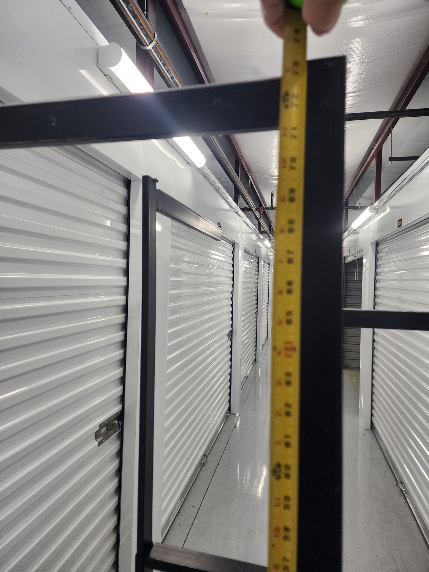 Multi-arm Clothing rack retail display Black Metal with wheels