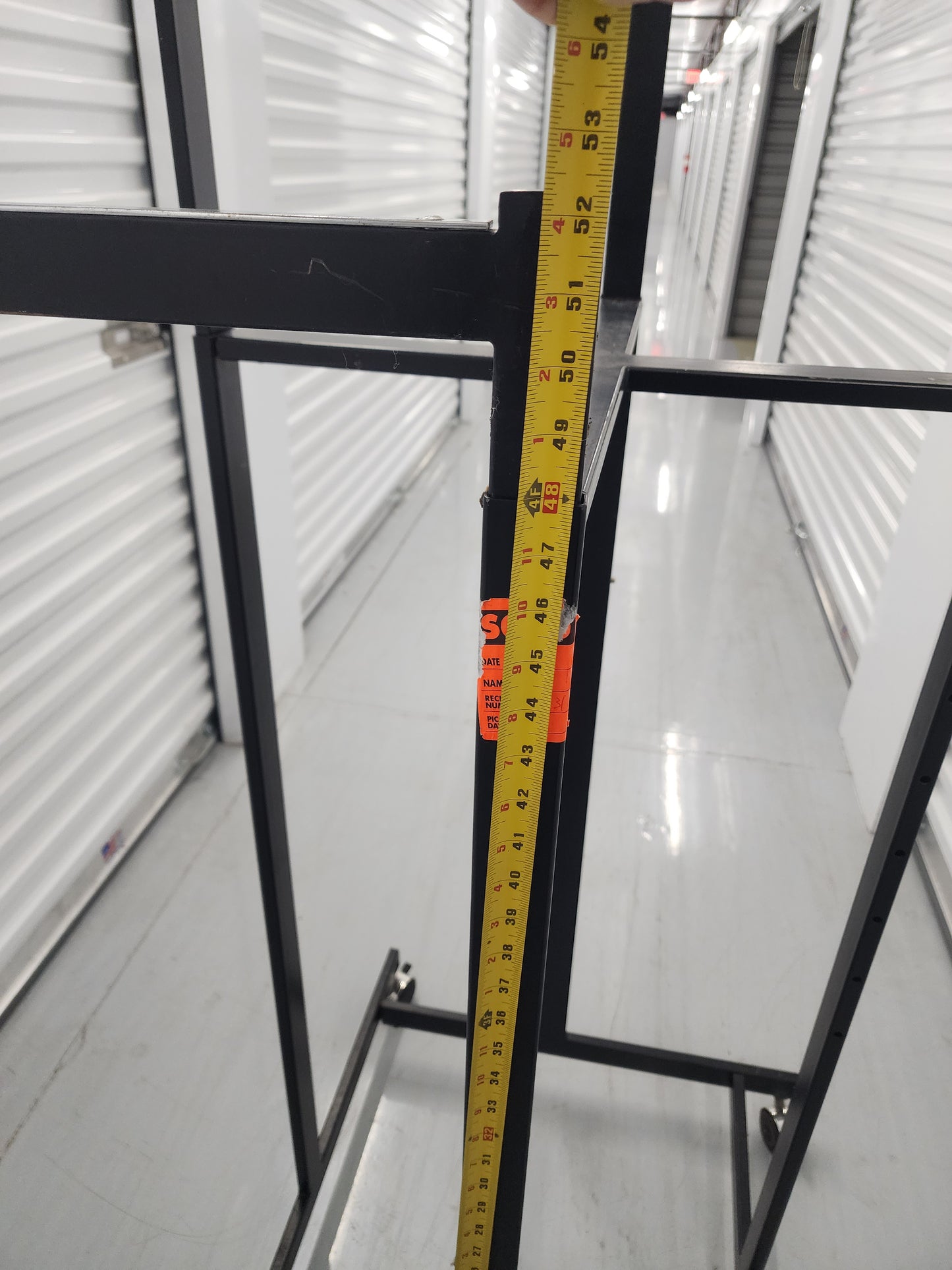 Multi-arm Clothing rack retail display Black Metal with wheels