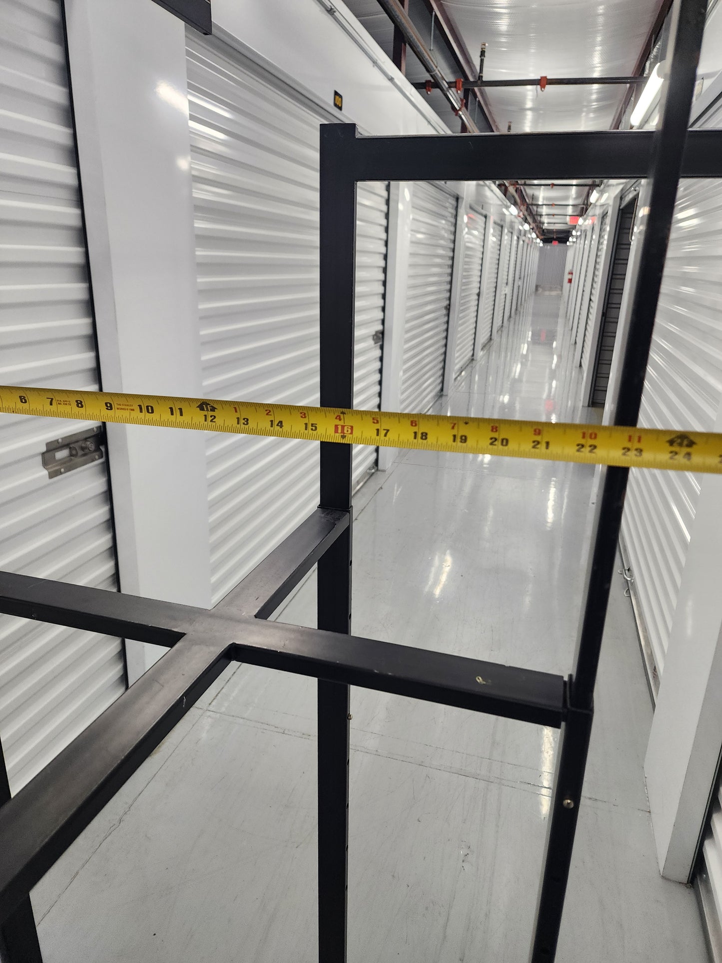 Multi-arm Clothing rack retail display Black Metal with wheels